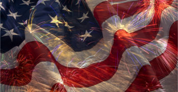American Flag, flying fireworks and Constitution montage