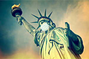 Statue of Liberty wearing a surgical mask.